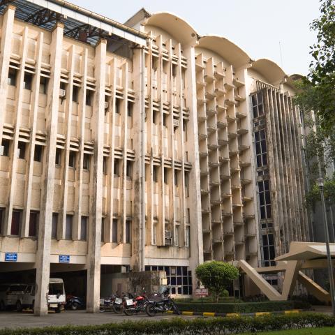 View of main building front that includes parking lot