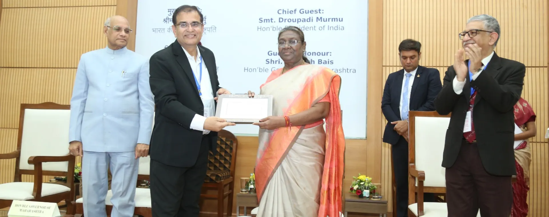President Of India Droupadi Murmu receiving memento